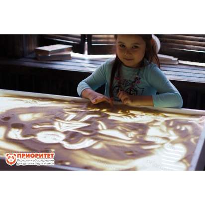 Рисунки песком на световом столе