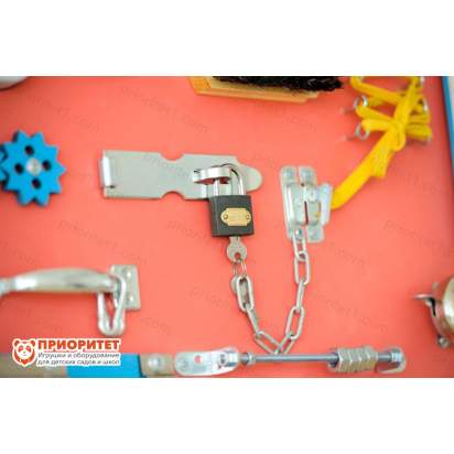 Бизиборд розовый для девочек с замочками